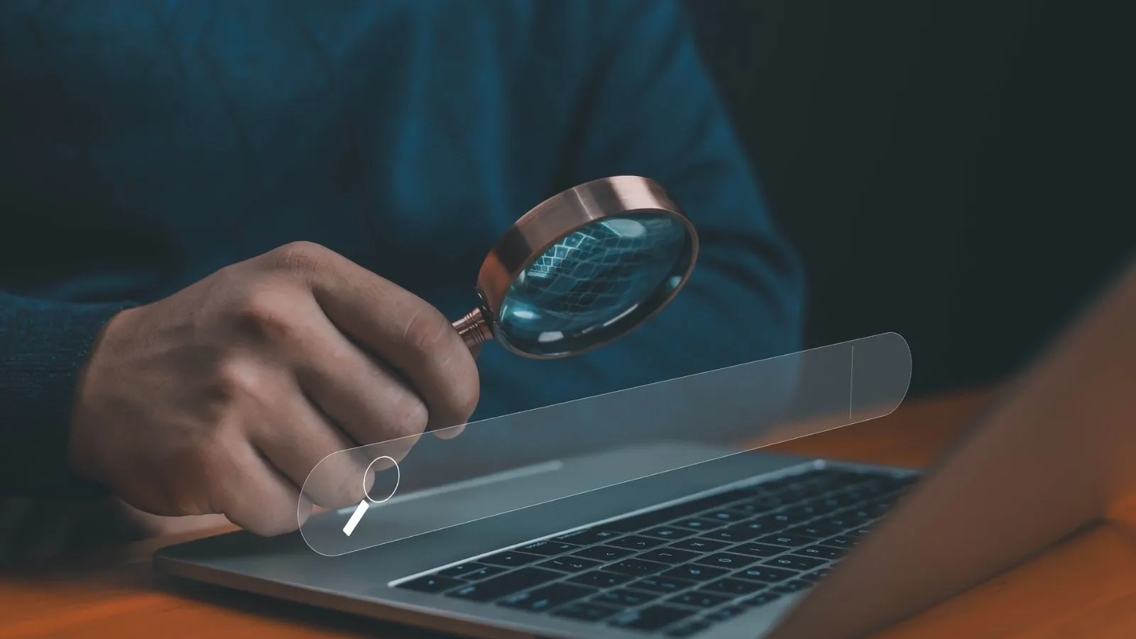 Businessman with magnifying glass near laptop and search bar, symbolizing multilingual search and retrieval evaluation